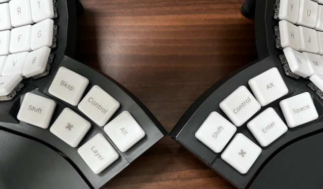 Split keyboard with thumb cluster
